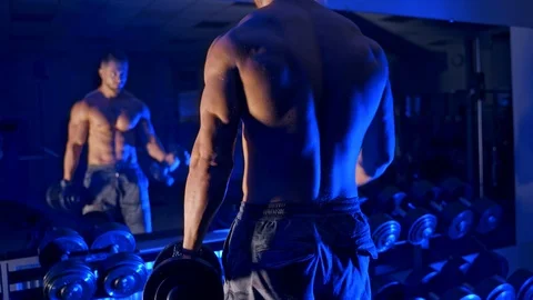 Man trains in the gym Stock Footage 119263213