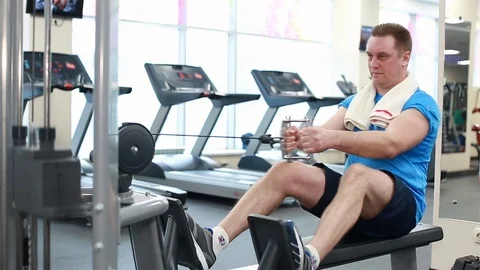 Man trains the muscles of the back Stock Footage 102227582