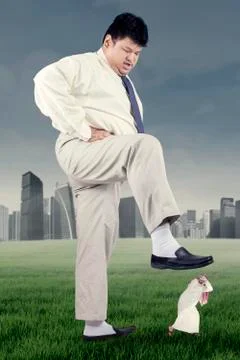 Man trampling down his rival Foto stock