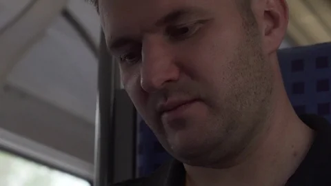The man is traveling by train. Stock Footage 95838768