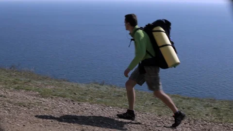 Man travels with a backpack Video stock 101972261