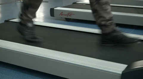 Man on treadmill at gym close-up Stock Footage 37433856