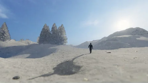 Man trekking on a mountain in winter time, snow falling Stock Footage 137024232