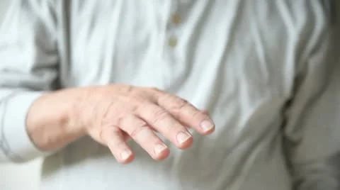 Man with a tremor Stock Footage 11400957