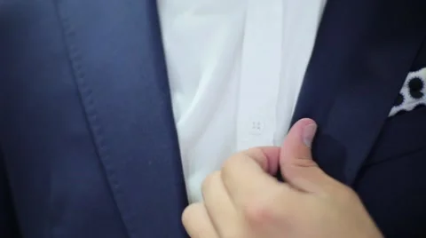 Man tries on a jacket Stock Footage 68051166