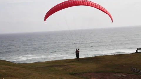 Man tries parasailing Stock Footage 49832951