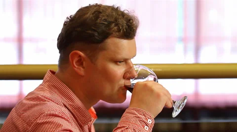 Man tries to wine. Stock Footage 28782304