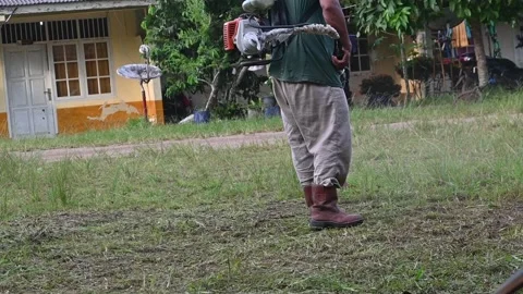 A man with trimmer. Stock Footage 296092354