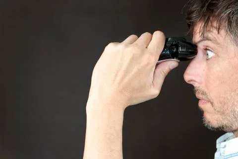 Man trims monobrow Stock Photos