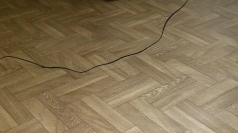 Man tripping over hanging digital phone wire Stock Footage 93978833