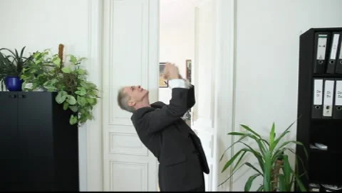 A man triumphs in office Vídeos de archivo 8987026