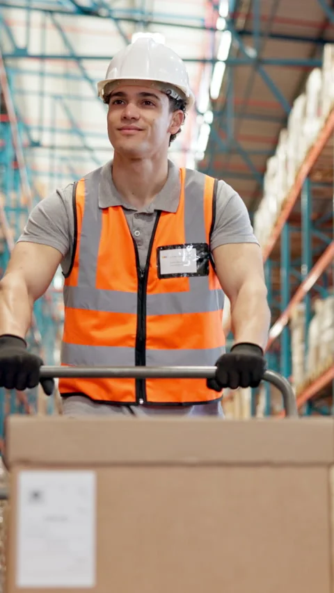 Man, trolley and walking with box at warehouse to transport stock, export cargo Stock Footage 319035874