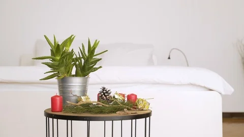 Man try to put wallet in bedside table with authentic Chrismas decoration. Video stock 102654418
