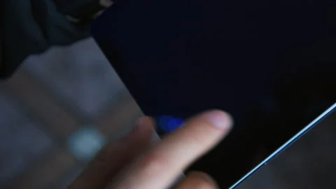 Man try unlock tablet with finger print on screen Video stock 130715774