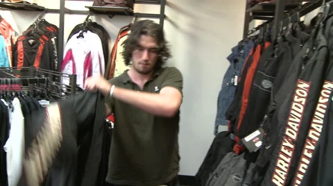 Man Trying On Black Jacket Video stock 45496504