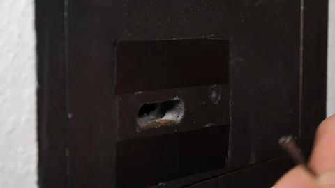 The man is trying to break into the hotel safe Video stock 90334854