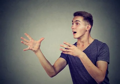 Man trying to catch something Stock Photos