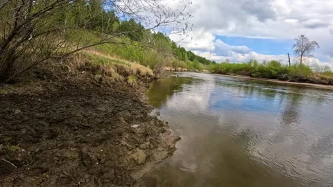 A man is trying to get out of the river A man drowns in a river Stock Footage 260867330
