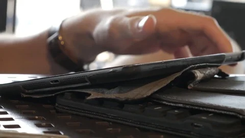 Man trying to get Tablet to work Stock Footage 75489217