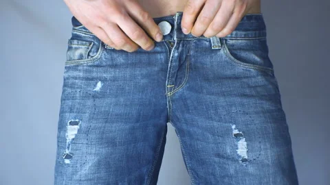 Man trying on jeans. Stock Footage 102457859