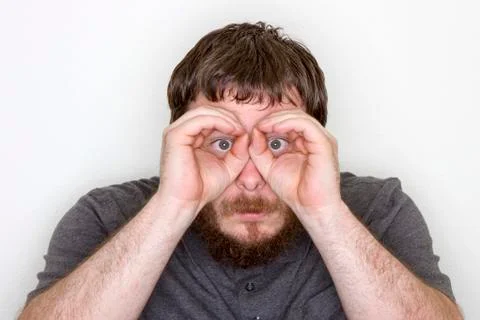 Man trying to spy Stock Photos