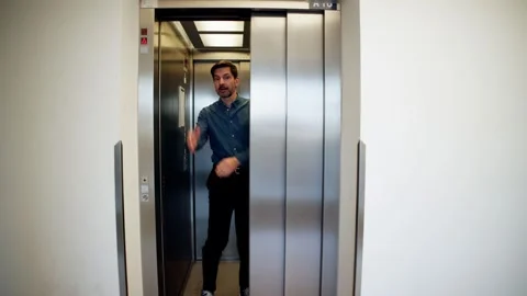 Man Trying To Stop Door Stock Footage 273782026