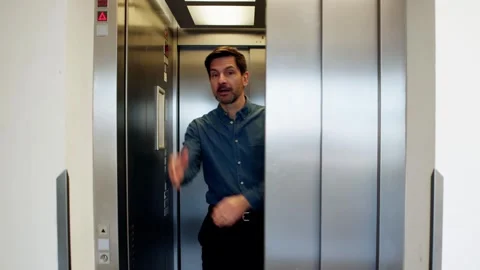 Man Trying To Stop Door Stock Footage 274373316