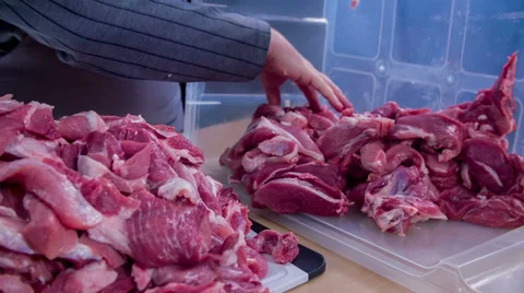 Man is trying to take all the meat out of the container Stock Footage 59737640