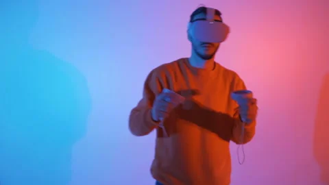 Man trying virtual reality for the first time Stock Footage 143640429