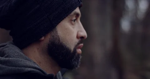 A Man Trying to Warm Up in a Cold Forrest Stock Footage 124701279