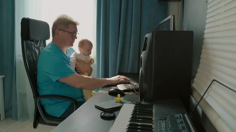 Man Trying To Work At Home At A Computer During A Pandemic. Stock Footage 127712896
