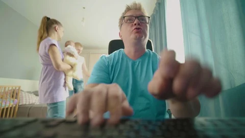 Man Trying To Work At Home At A Computer During A Pandemic. Stock Footage 127713427