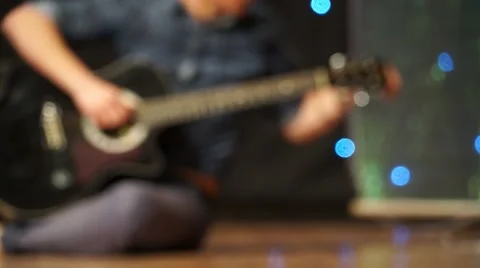 Man tuning Guitar Stock Footage 54716699