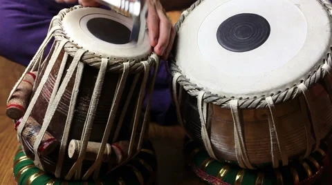 Man tuning on Indian tabla drums Stock Footage 58028010