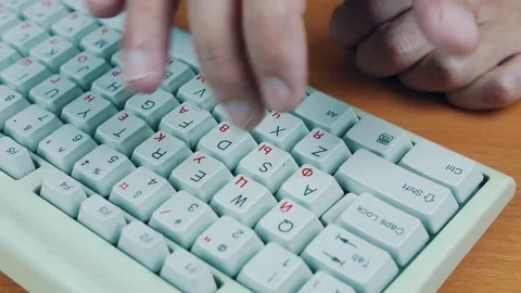 A man is tuping on the keyboard numbers Stock Footage 70168607