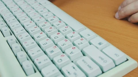 A man is tuping on the keyboard numbers Stock Footage 70169294