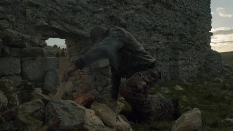 Man Turn on Fire in Mountain Stock Footage 75206904