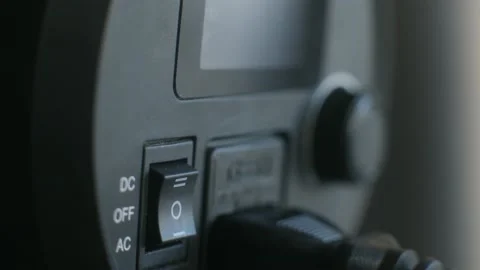 Man turn off an LED video light. Close up Stock Footage 237627768