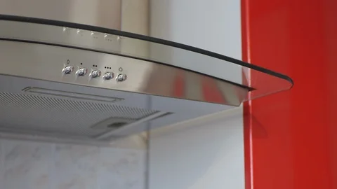 The Man Turning On And Off The Lights On The Kitchen Hood. Stock Footage 119279589