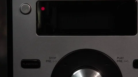 Man turning on audio player Stock Footage 81684667