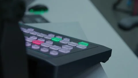 A man turning on black control panel with a green and red lights on it Stock Footage 271069857