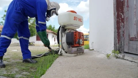 Man turning on cleaning machine with alcohol anti corona virus Stock Footage 153345596