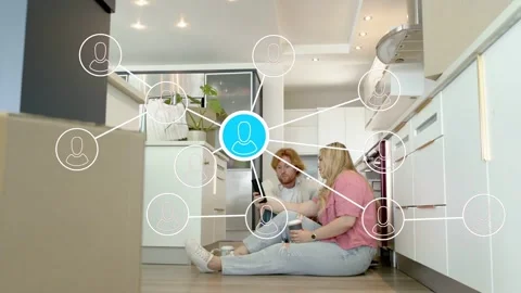 Man turning device toward partner, network nodes converging to blue node between Stock Footage 336714252