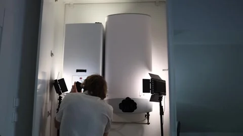 Man turning on home boiler checking temperature and preparing heating system for Stock Footage 318868683