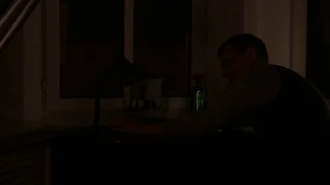Man turns on and off the table lamp 스톡 동영상 70244827