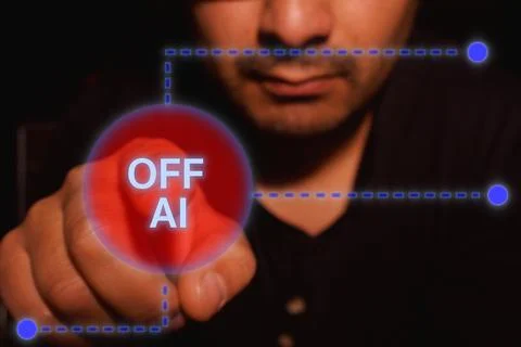 Man turns off artificial intelligence button Stock Photos
