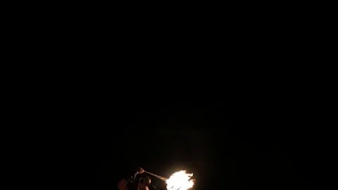 Man turns the ball of fire in the dark. go sparks Stock Footage 71538716