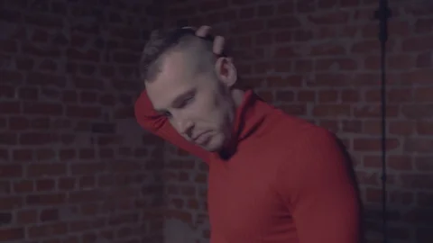 The man turns to the camera Stock Footage 105565416