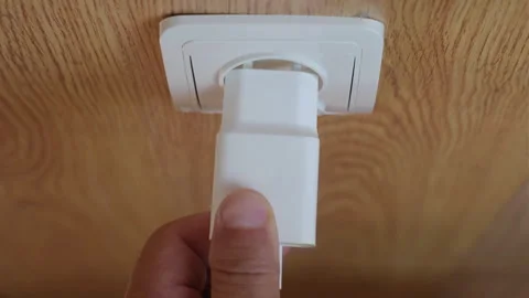The man turns on the charger Stock Footage 248419958