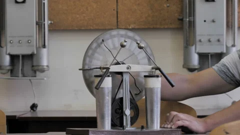 The Man Turns The Electrostatic Machine Stock Footage 137797704